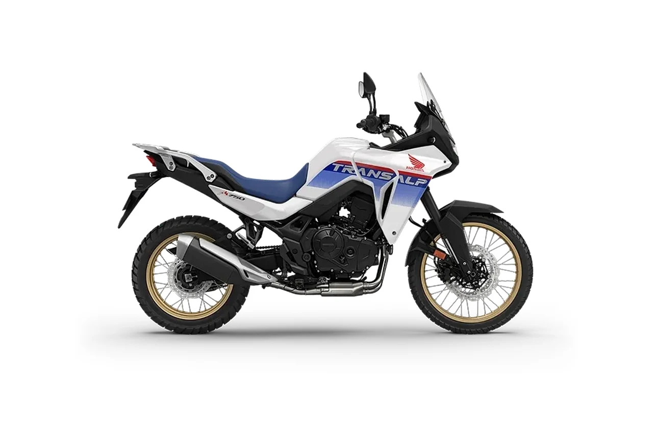 Honda XL 750 Transalp branca, azul e vermelha, vista de lado
